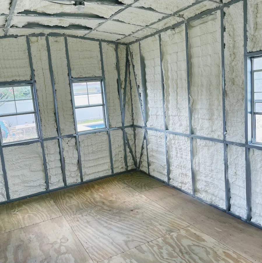 Closed-cell spray foam insulation applied to wall cavities in a residential project in Houlton